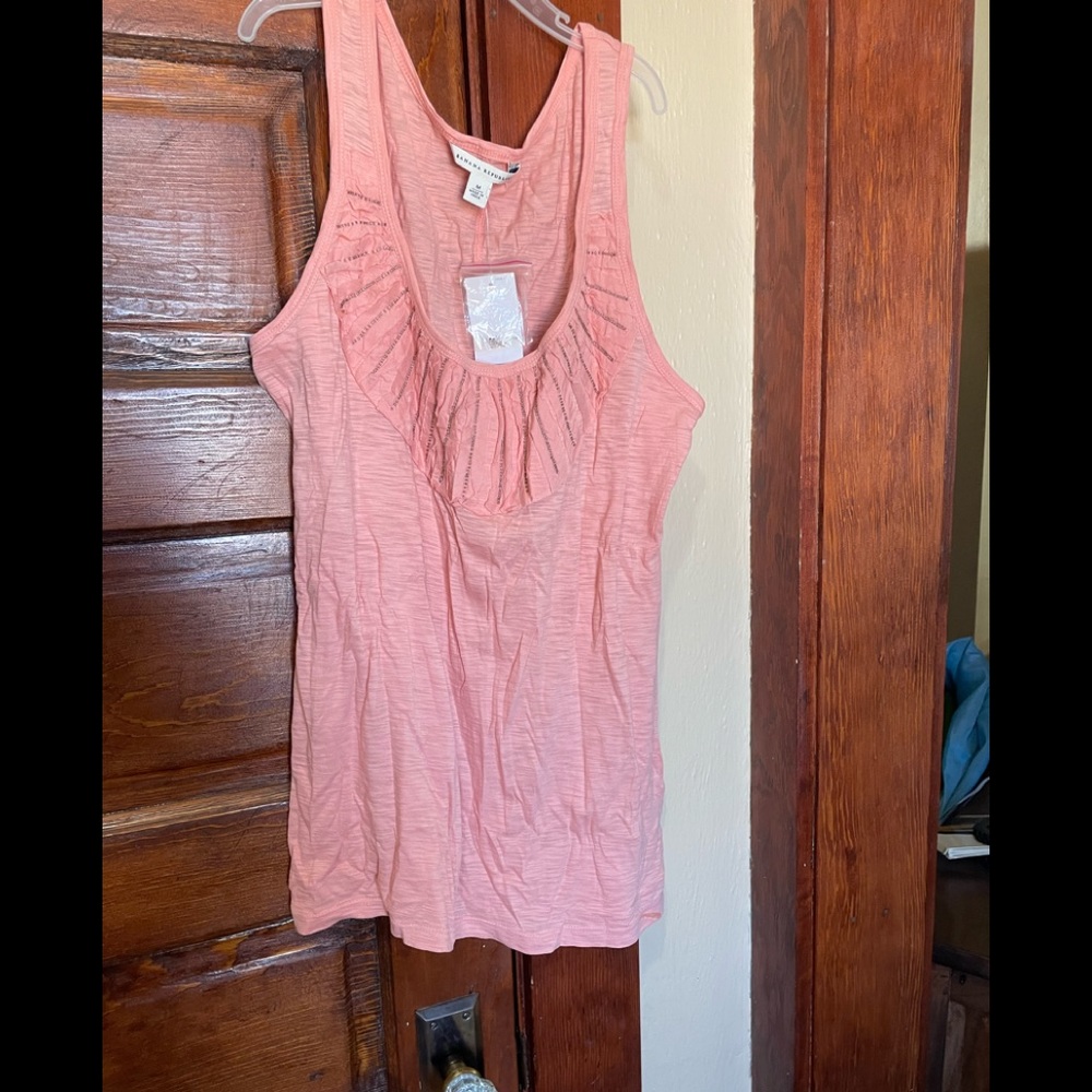 Pink tank top.